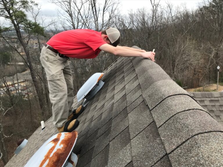 Inspector checking the roof